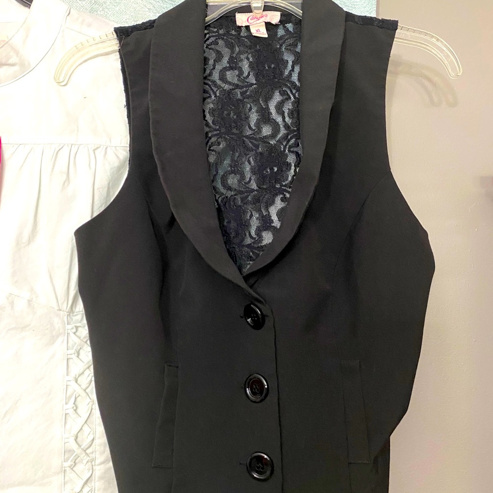 Candie’s black vest with lace back